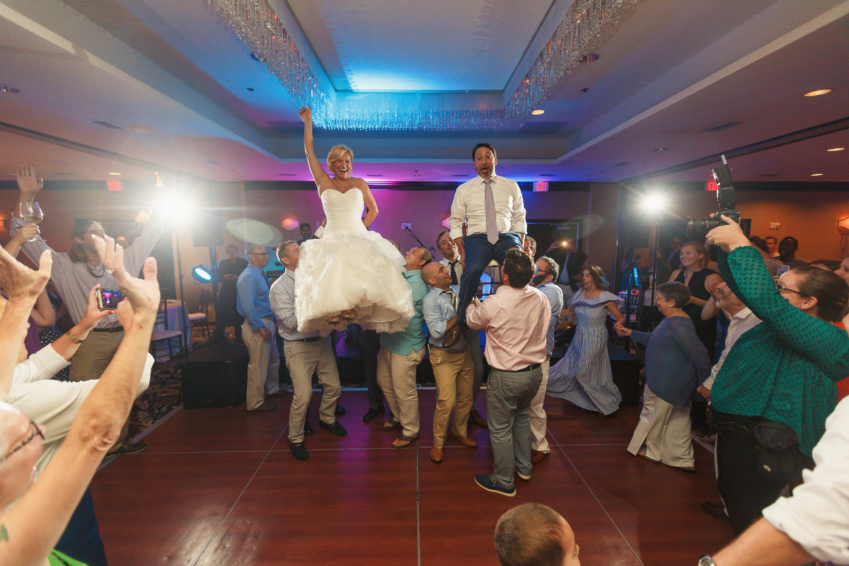 One Ocean Wedding Reception Party with Bride and Groom Being Lifted into the Air