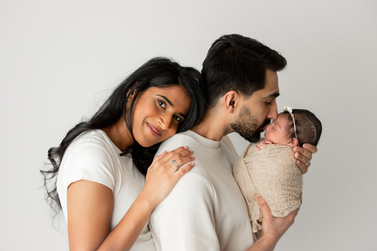 Newborn and family pose