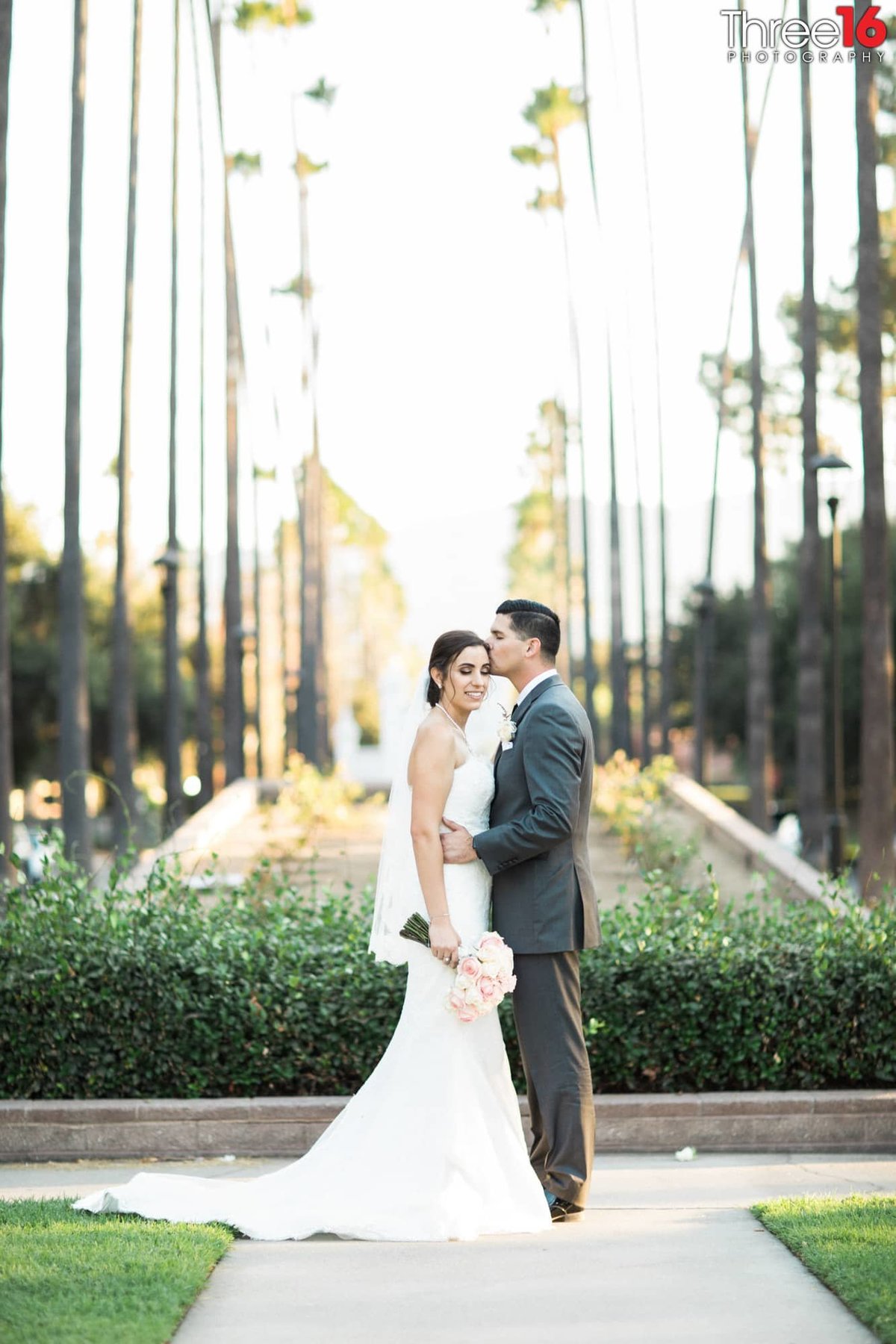 Bride an d Groom share an intimate moment after a Brand Library Park wedding ceremony