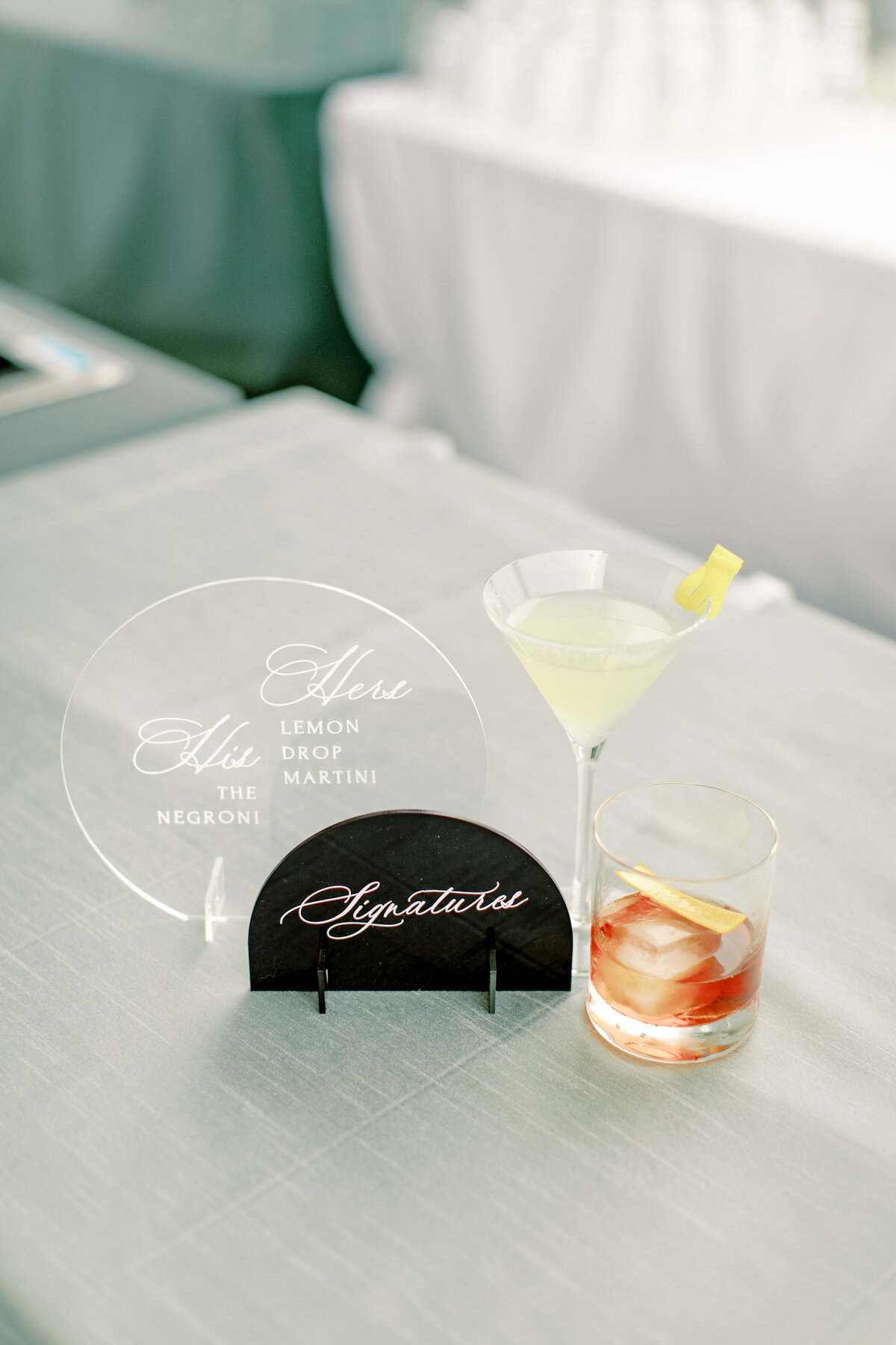 Modern signature cocktail signs and drinks, black and clear acrylic signage, wedding signage inspiration, bar sign ideas