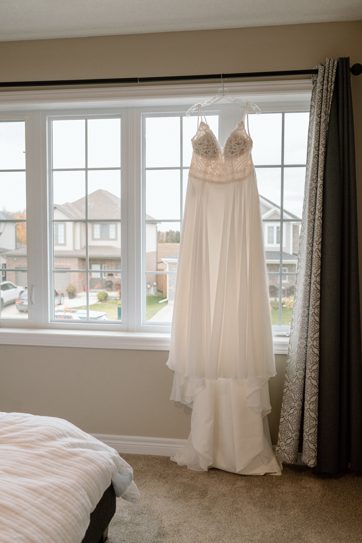 bride's dress hangs up