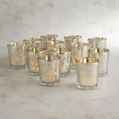 Candle vessels and candle rentals through Primrose and Petals.