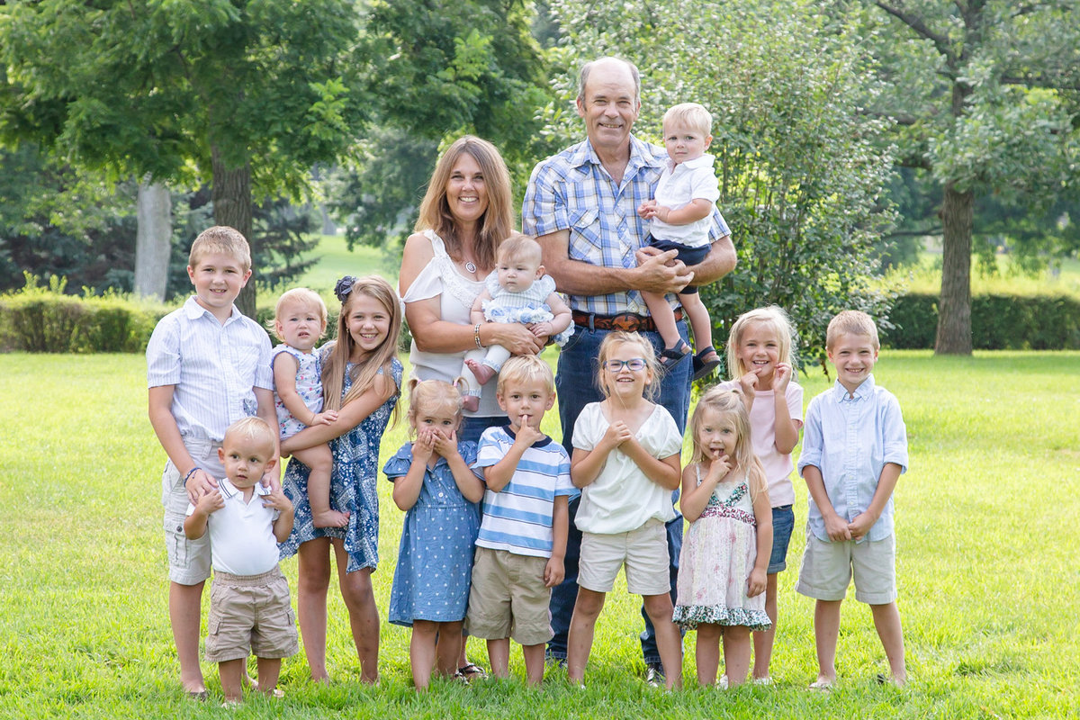 Family photo of couple and their grandchildren