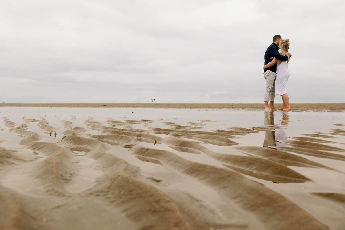 A couple stood on Formby Beach during their pre wedding photography shoot
