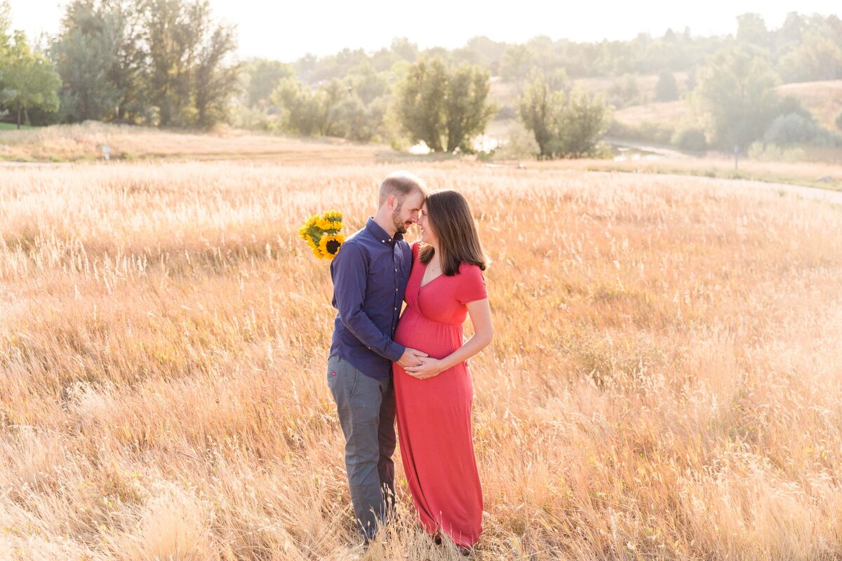 maternity session with sunflowers at Majestic View Park, Arvada, CO