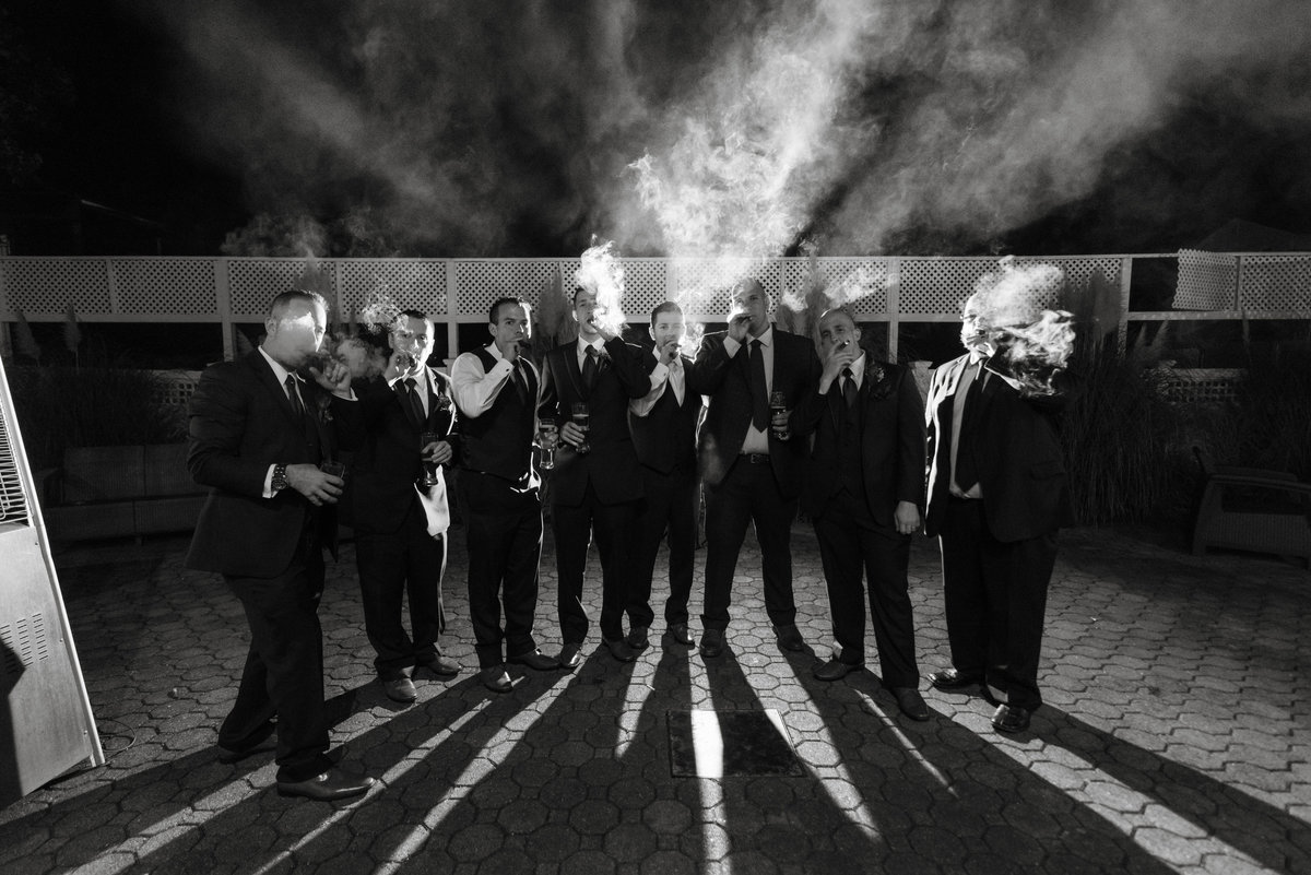 Groomsmen photo smoking cigars at Soundview Caterers
