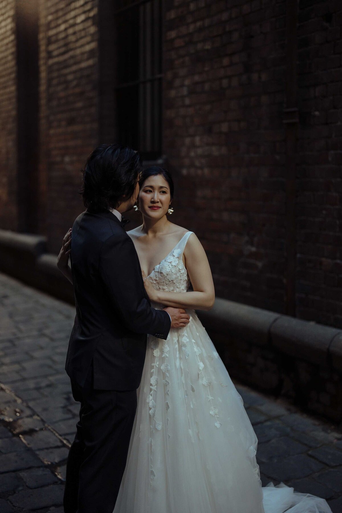 Wedding photographers in Melbourne capture stunning rooftop carpark first look.