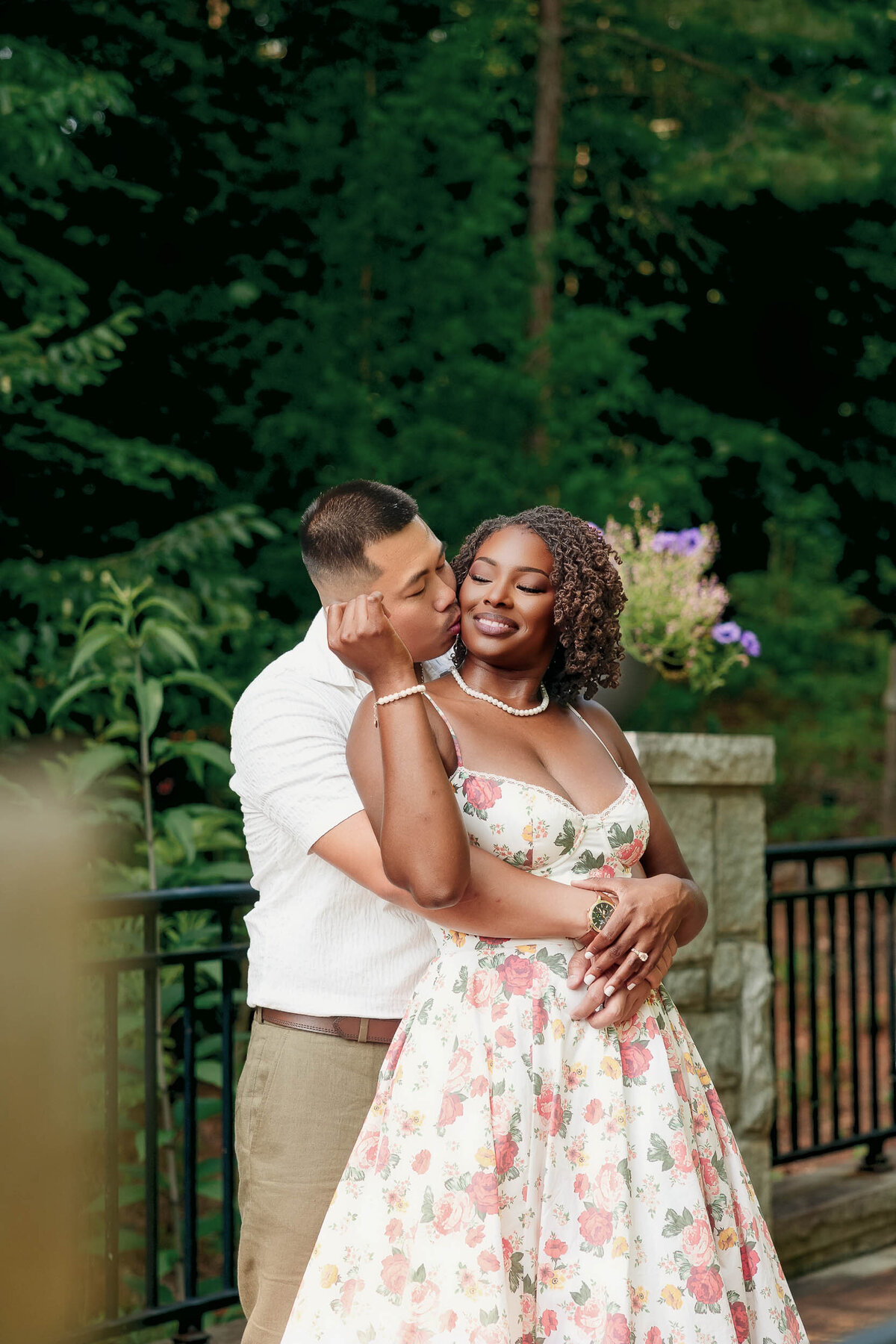 A romantic couple embrace during an engagement session in athens georgia 