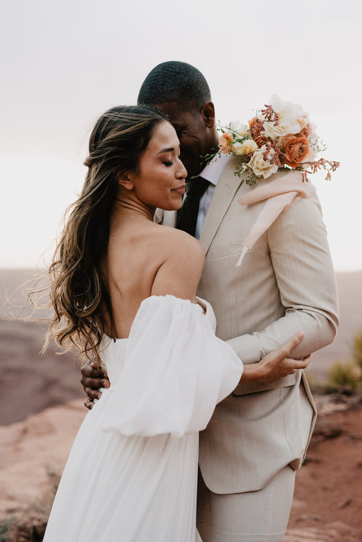 Utah Elopement Photographer captures couple hugging during wedding portraits