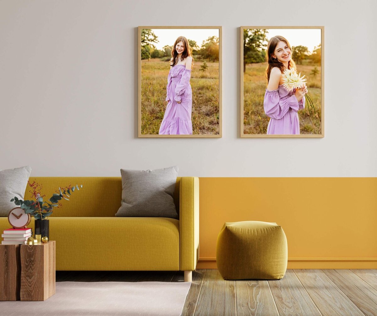 yellow themed living room with two senior photos of a girl in a purple dress hanging side by side