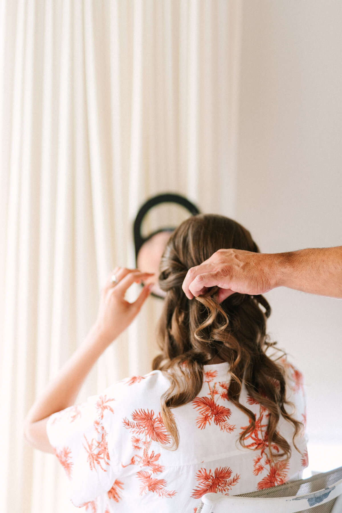 bridesmaid gets her hair done