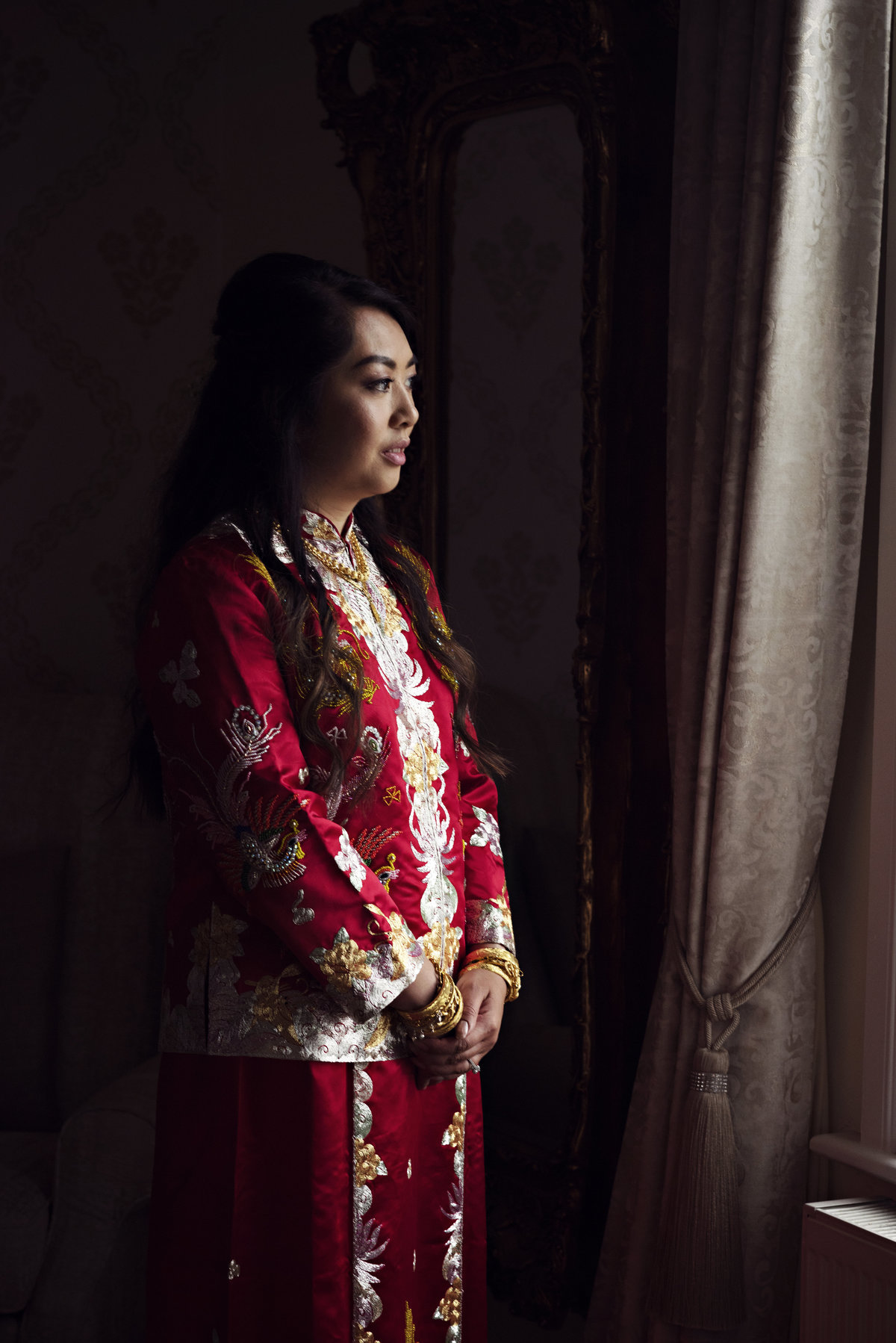 A bride in traditional Chinese Dress