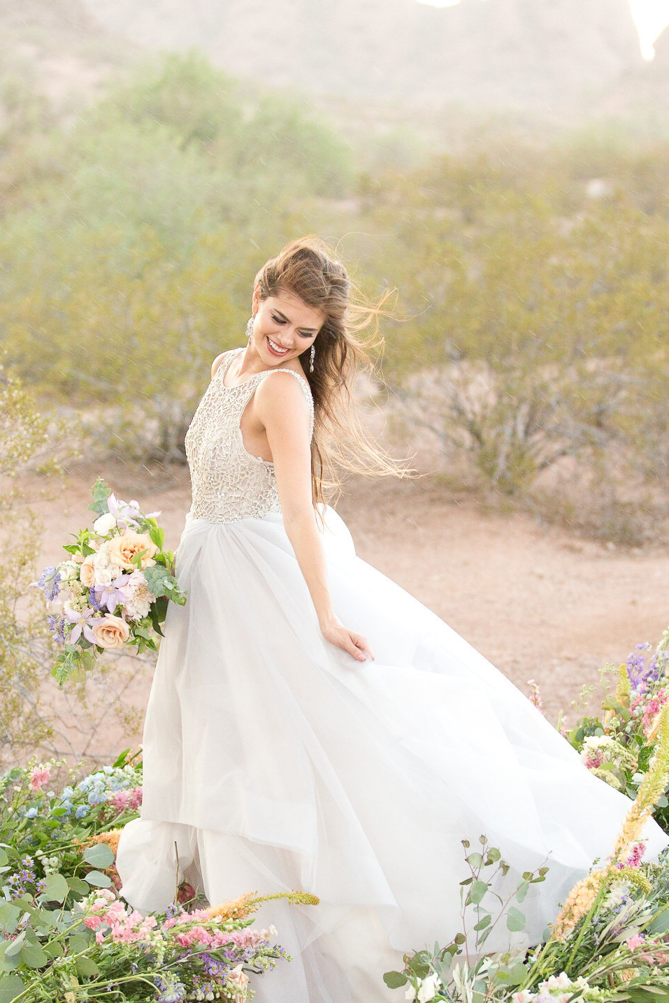 bridal portrait in desert wearing blush by Haley gown
