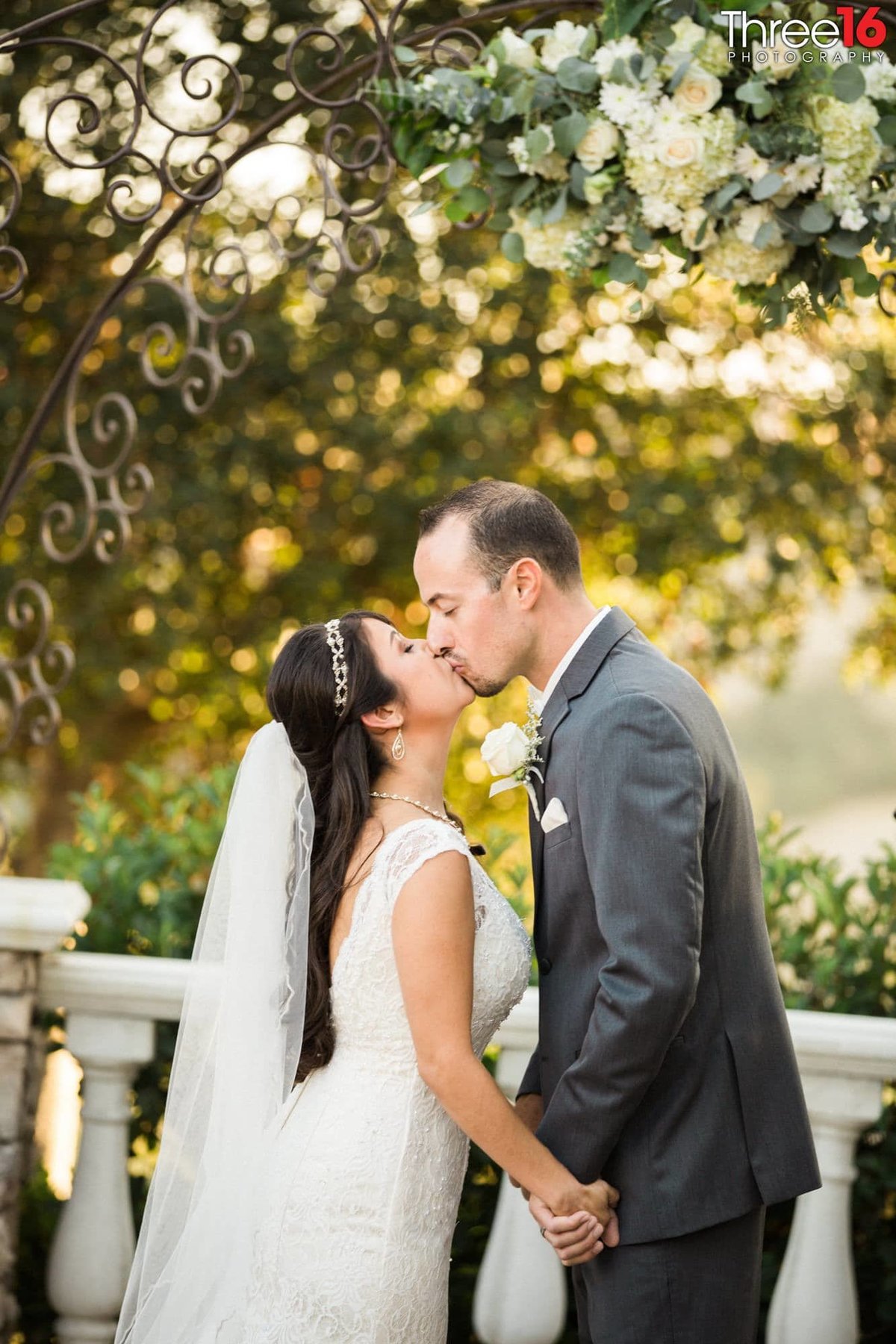 Bride and Groom share a tender kiss