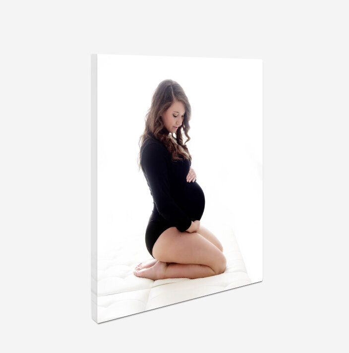 A fine art printed canvas of a maternity session