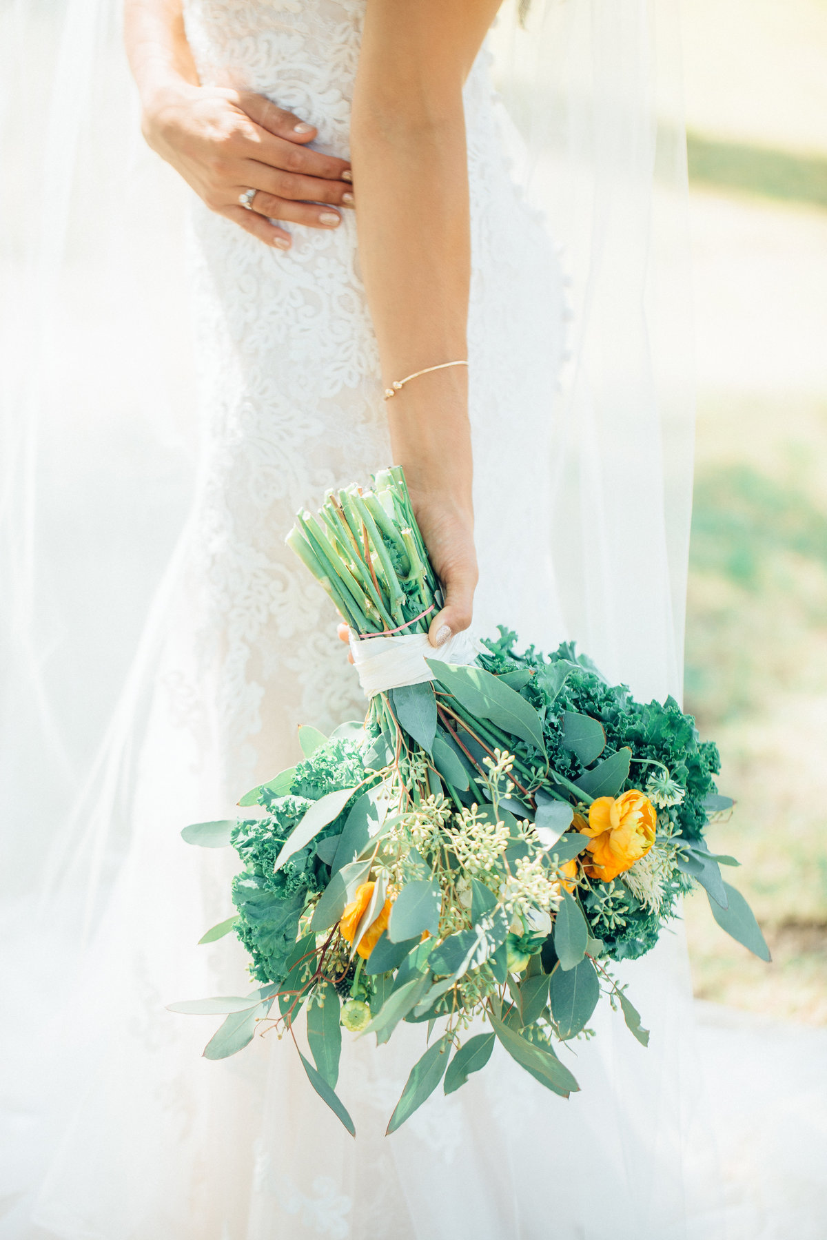 Wedding Photograph Of Bride In White Wedding Gown Showing a Bouquet Of Flowers Los Angeles