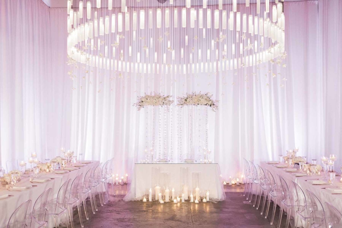 What a romantic all white reception Flora Nova Design created for this wedding at Canvas Event Space in Seattle