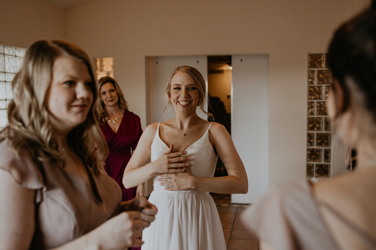 bride getting ready with her wedding party before ceremony