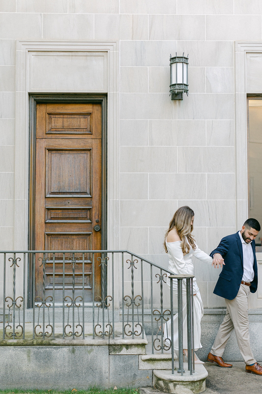 Couple embracing during golden hour engagement session in a Pittsburgh park