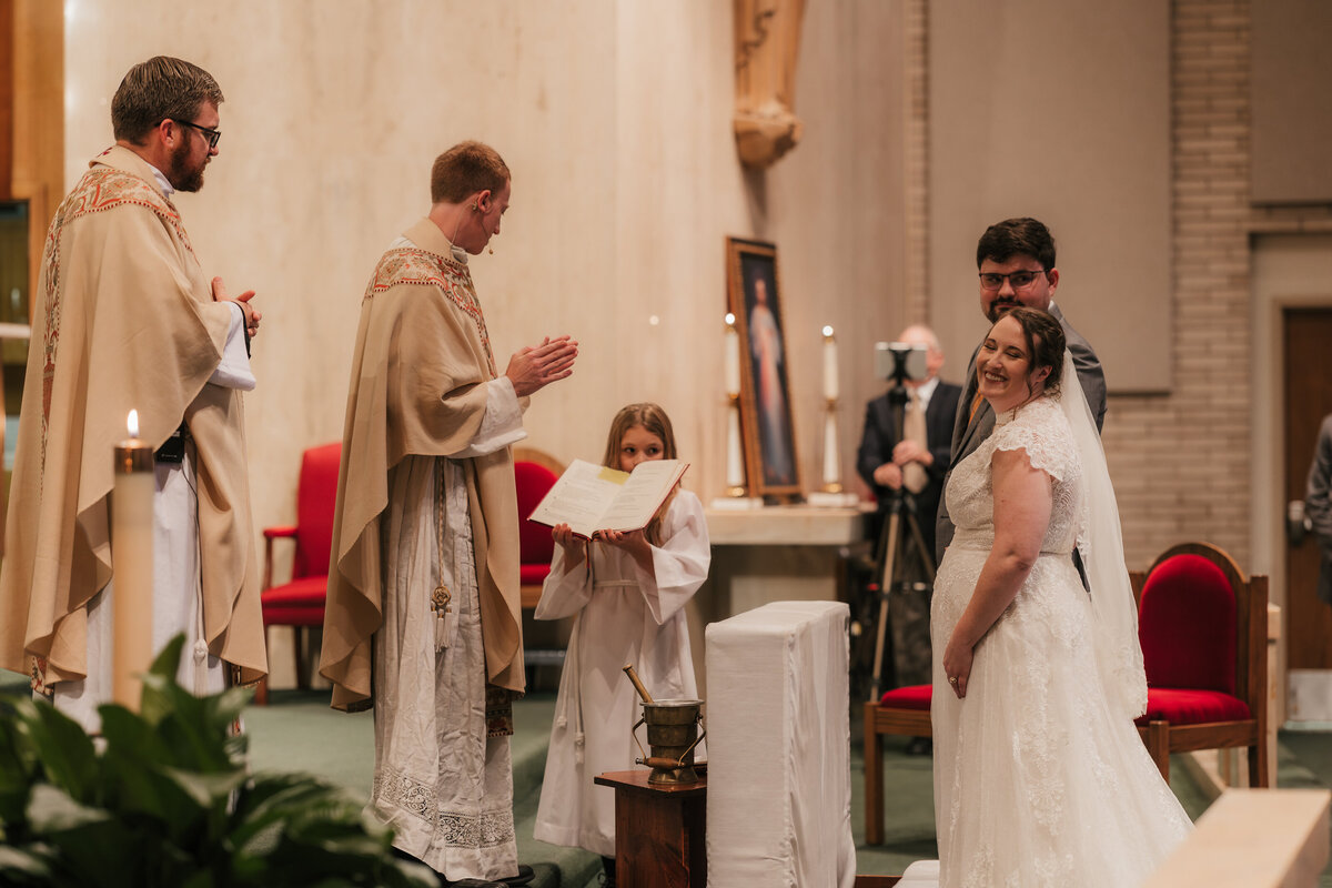bride and groom at Catholic wedding ceremony