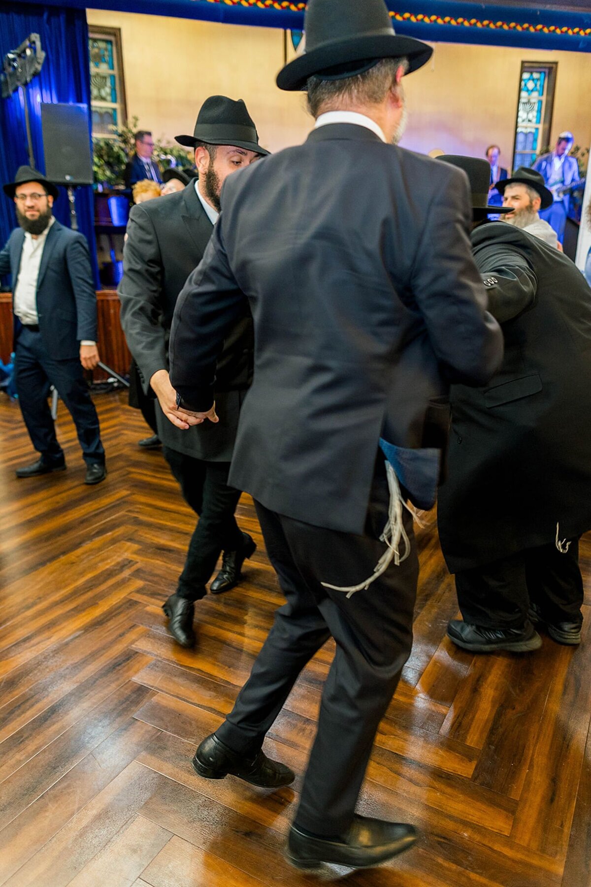 Eliana-Melmed-Photography-Chicago-LosAngeles-Jewish-WeddingPhotographer-CarmiKalman-MensDancing-00108