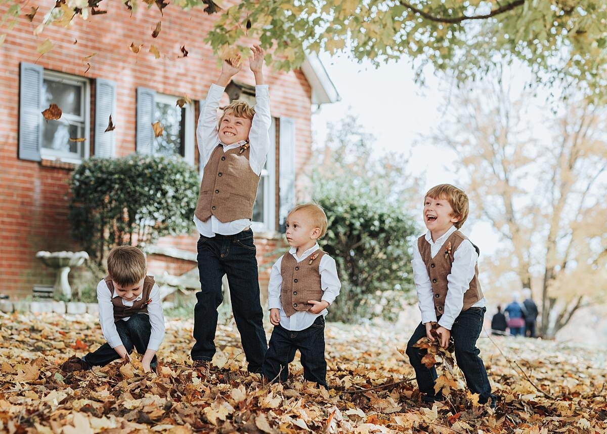 ring bearers throw leaves into the air