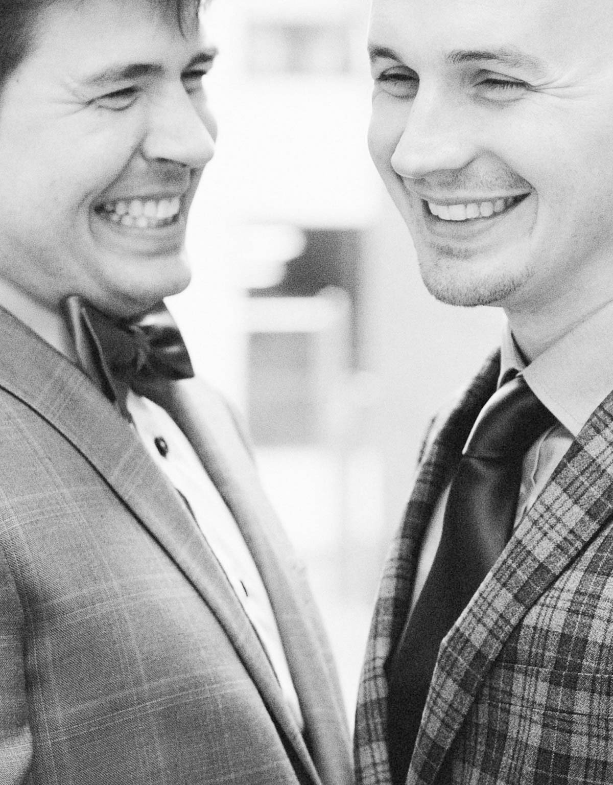 husbands laugh after wedding minneapolis minnesota