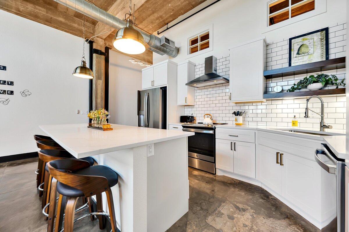 Bar height seating for four in this one-bedroom, one-bathroom vintage condo that sleeps 4 in the historic Behrens building in the heart of the Magnolia Silo District in downtown Waco, TX.