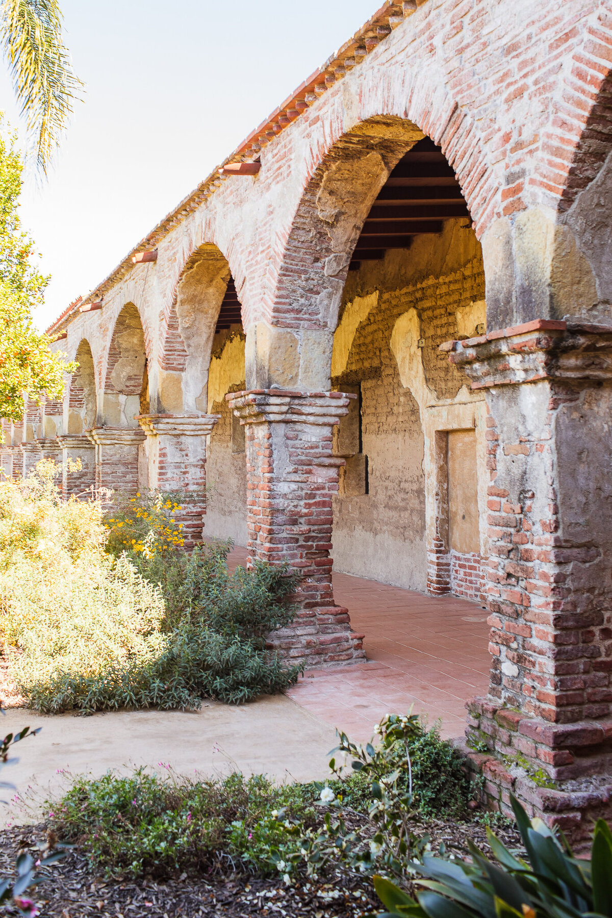 Arched walkways grace the airy corridors of this time-weathered Spanish mission  in the heart of the San Juan Capistrano historic district