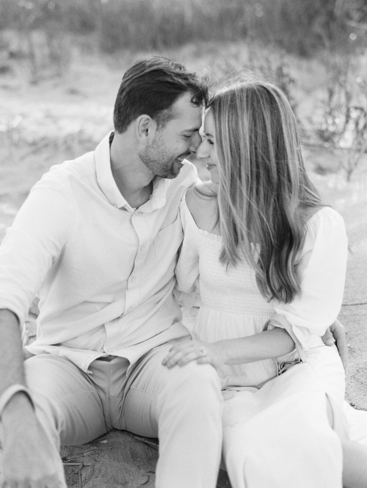 Engagement session done fully in black and white film on the beach in Charleston. Destination engagement session.