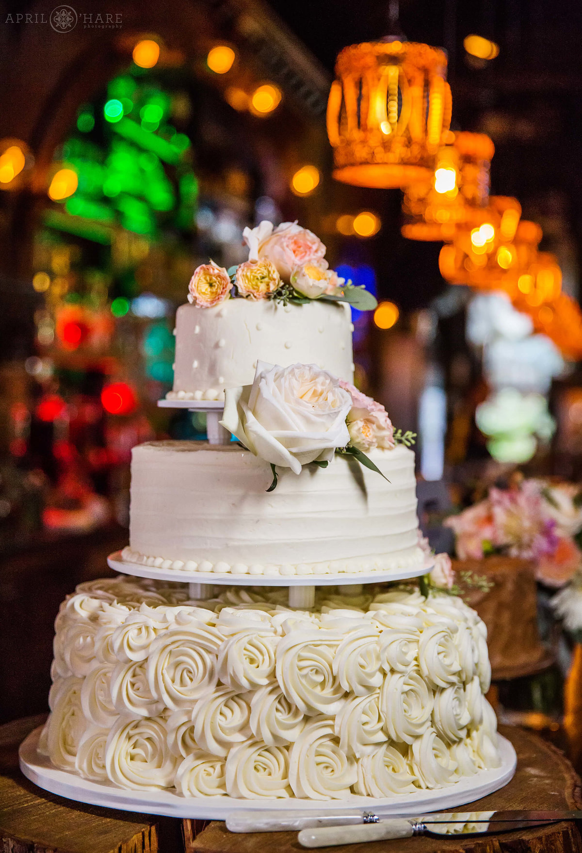 Crested Butte Wedding Reception with white wedding cake at Bonez Restaurant in Colorado