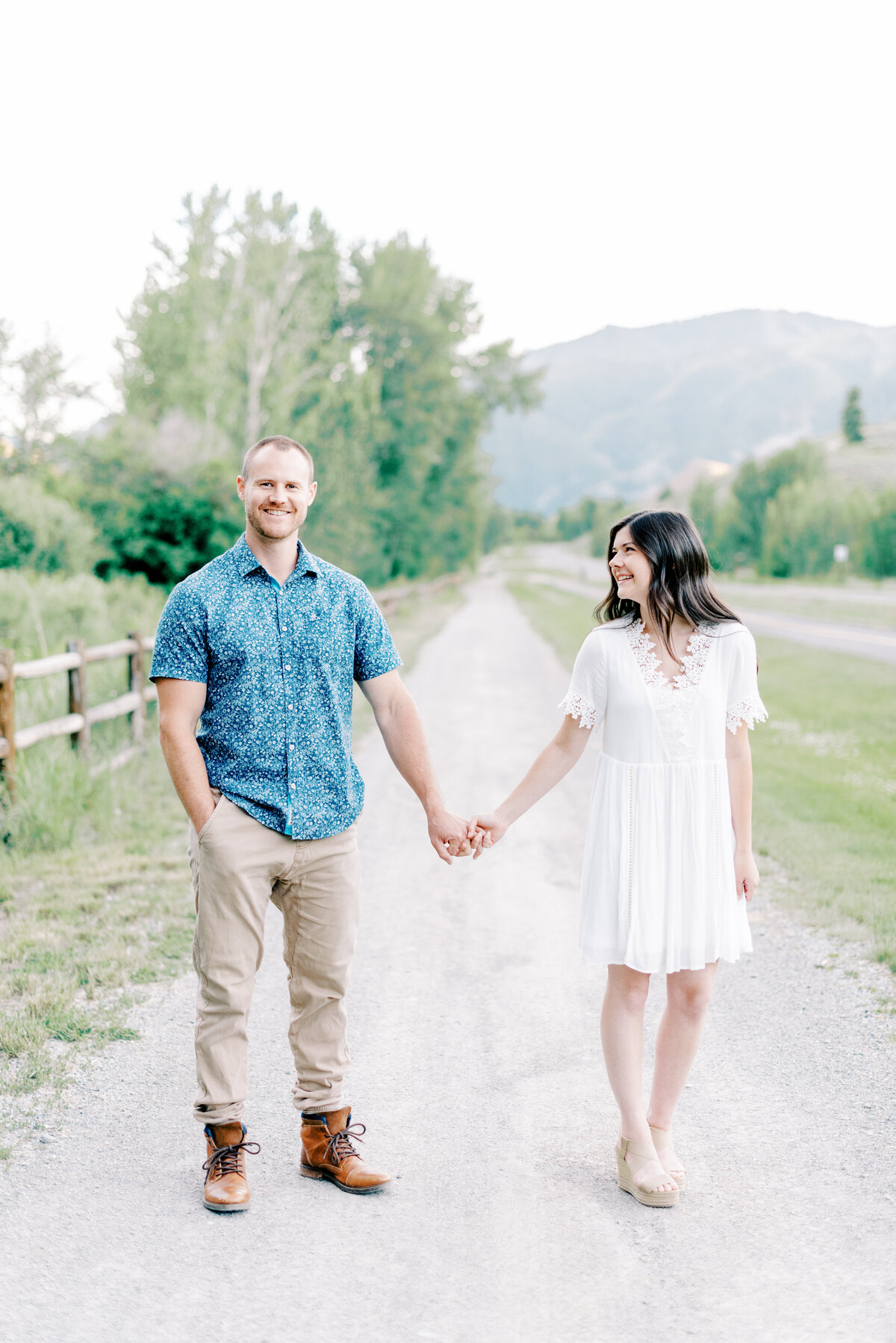Couple holding hands during Sun Valley Engagement Session with the Best Sun Valley Wedding Photographers