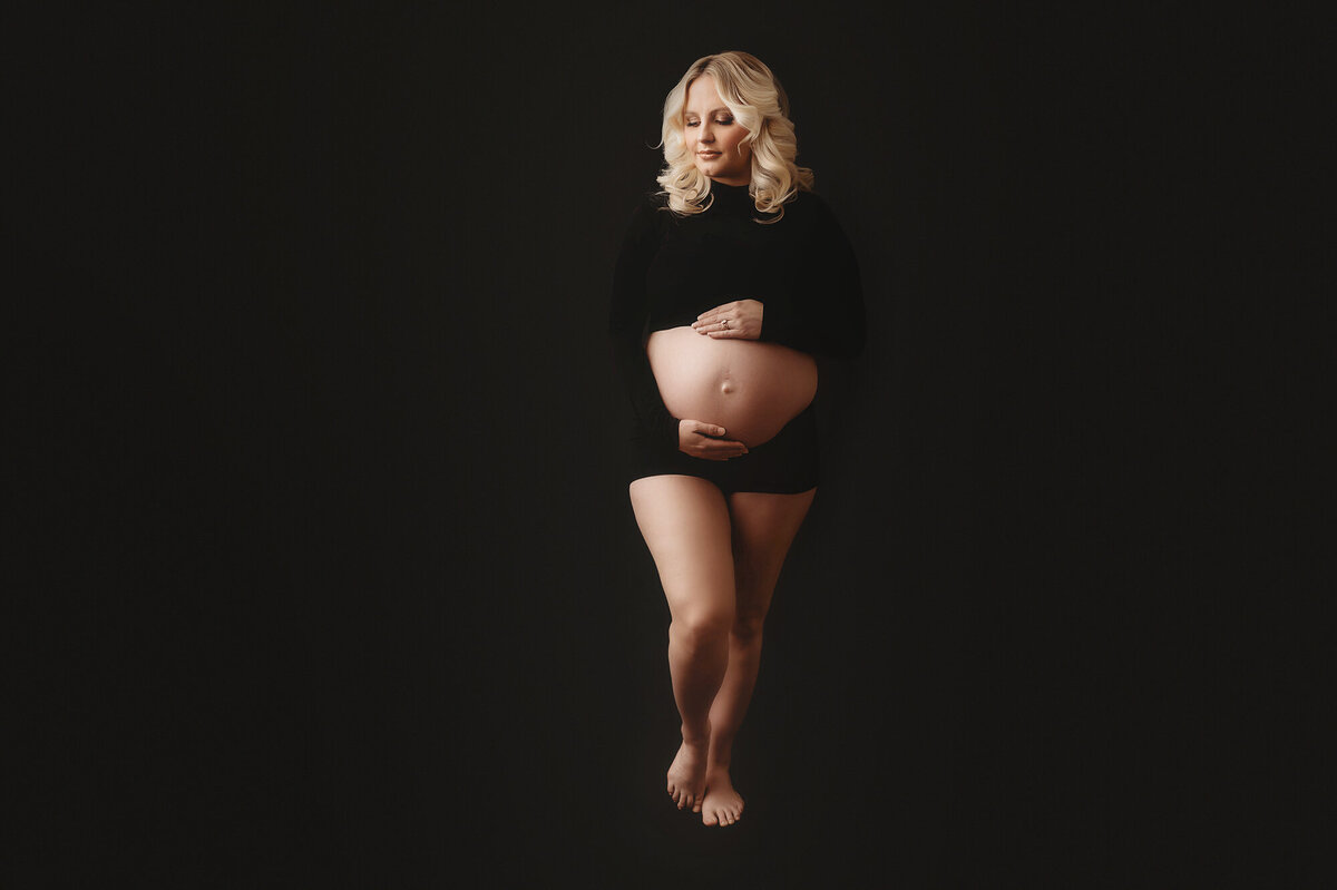 Pregnant woman poses for Studio Maternity Photos in Asheville, NC Maternity Portrait Studio.