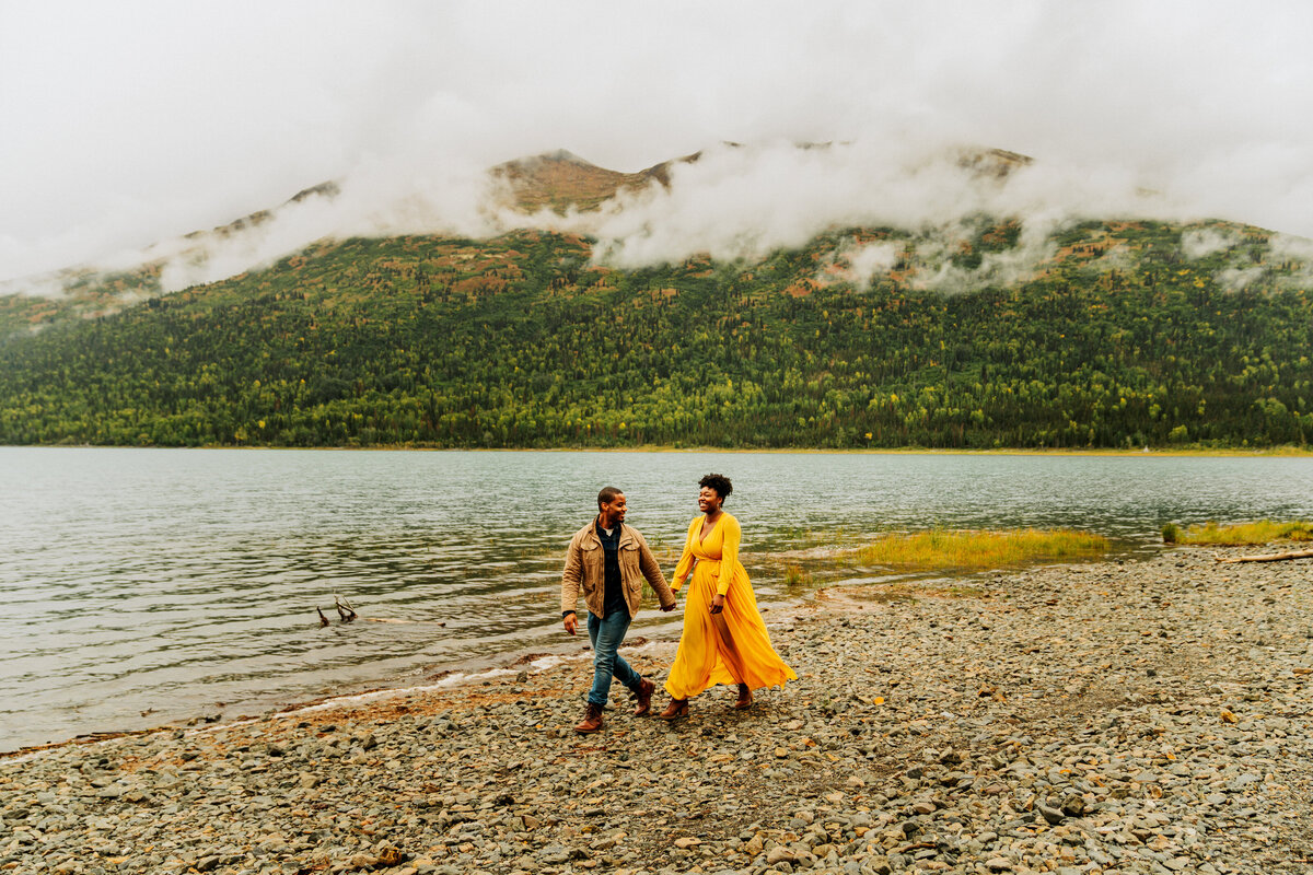 couple walking at Lake Eklutna in Alaska