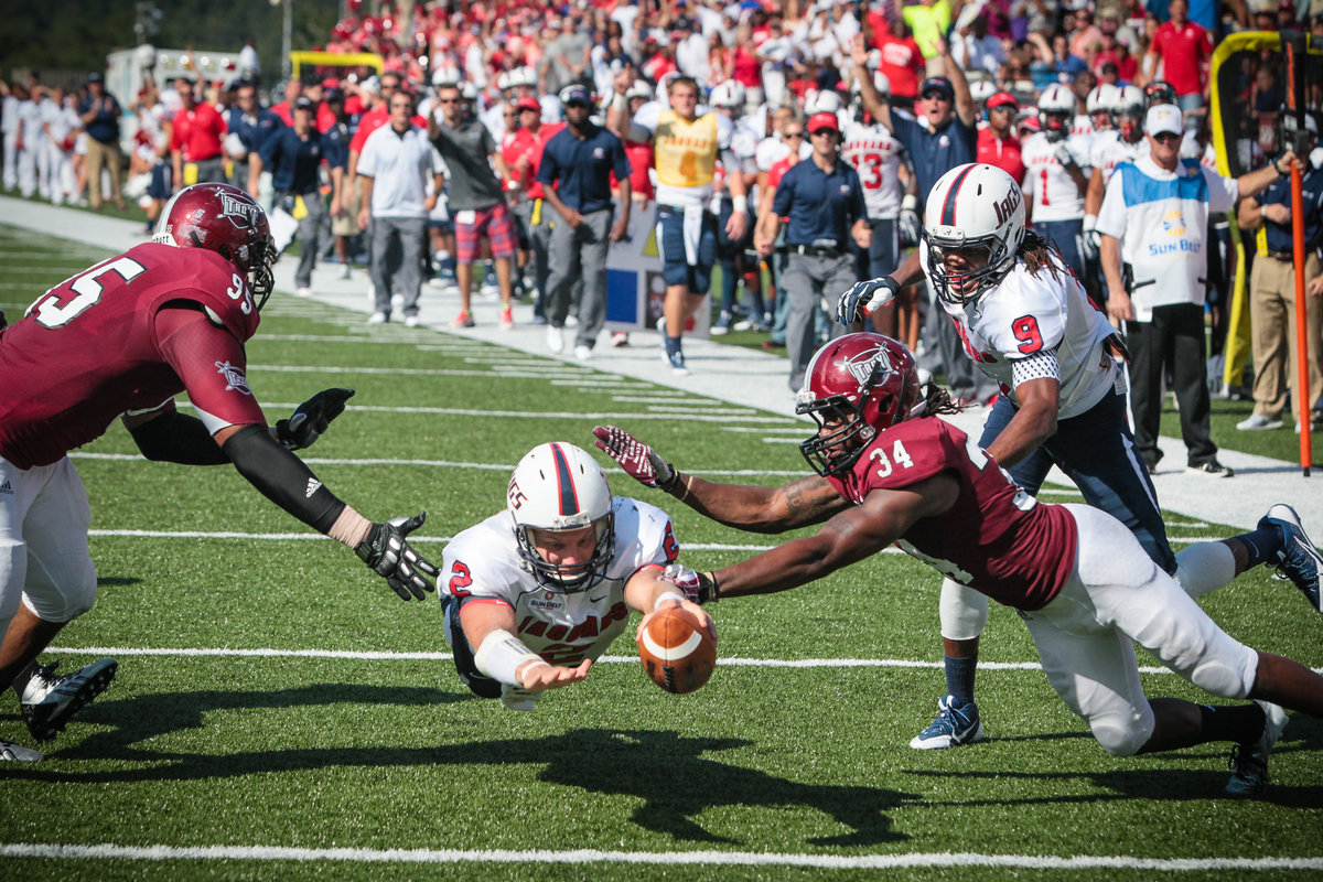 University of South Alabama quarterback dives into the end zone for a touchdown vs Troy.