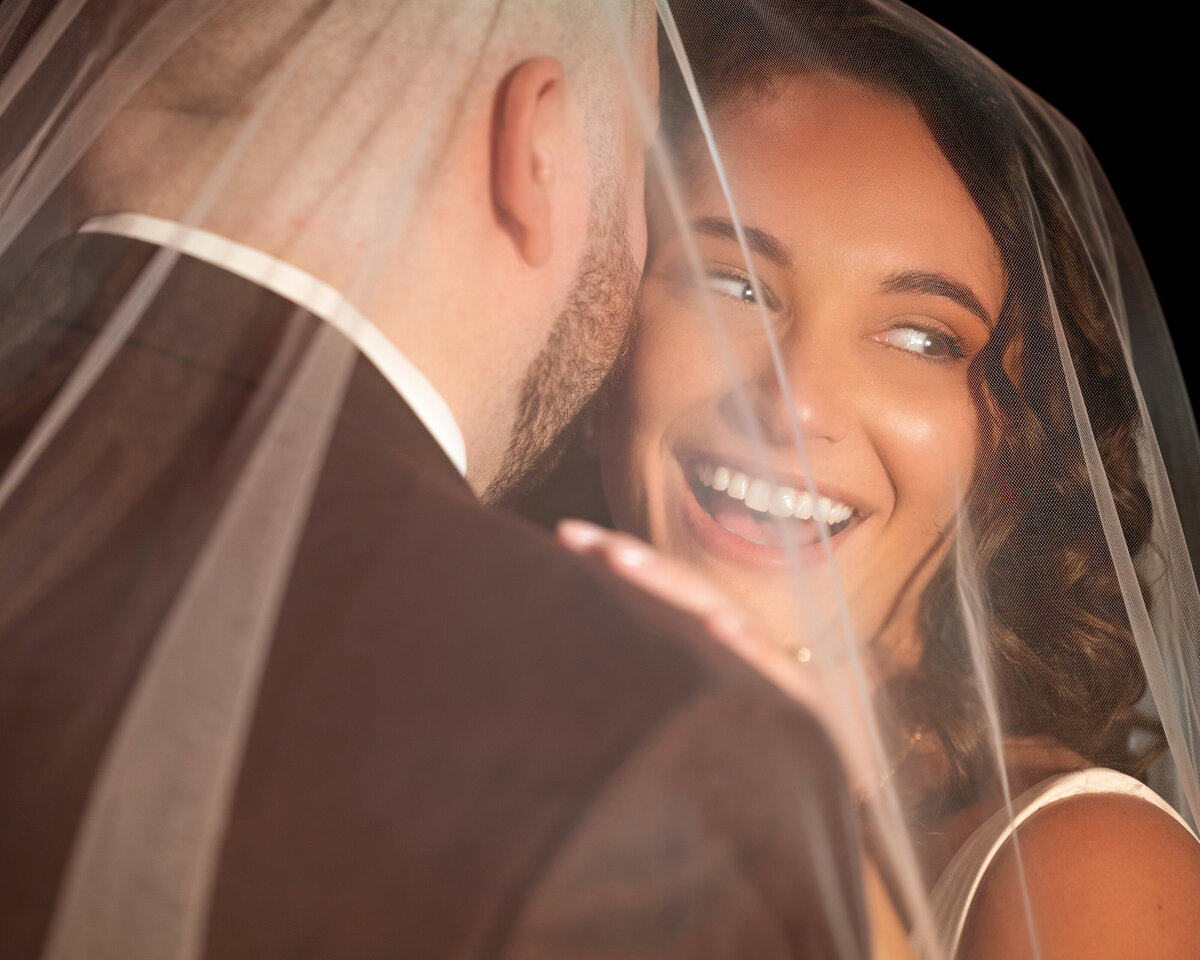 bride-groom-candid-under-veil-NJ-07746