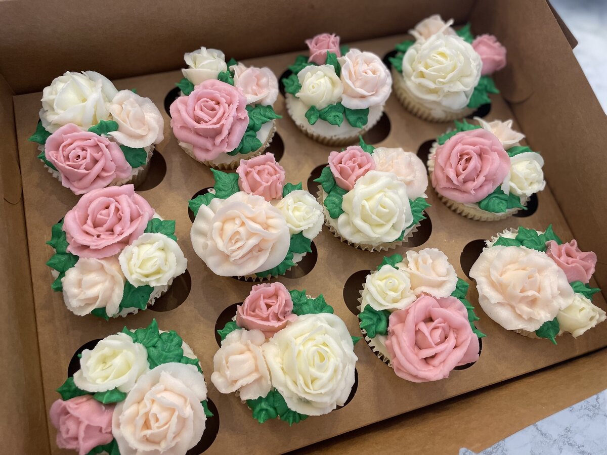 Custom-designed flower cupcakes with intricate icing details, perfect for events, made in Gilbert.