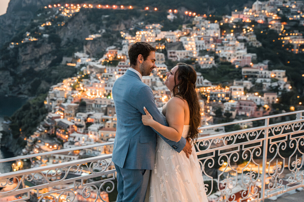 Married couple on balcony of Villa Oliviero in Positano, Amalfi Coast, Italy