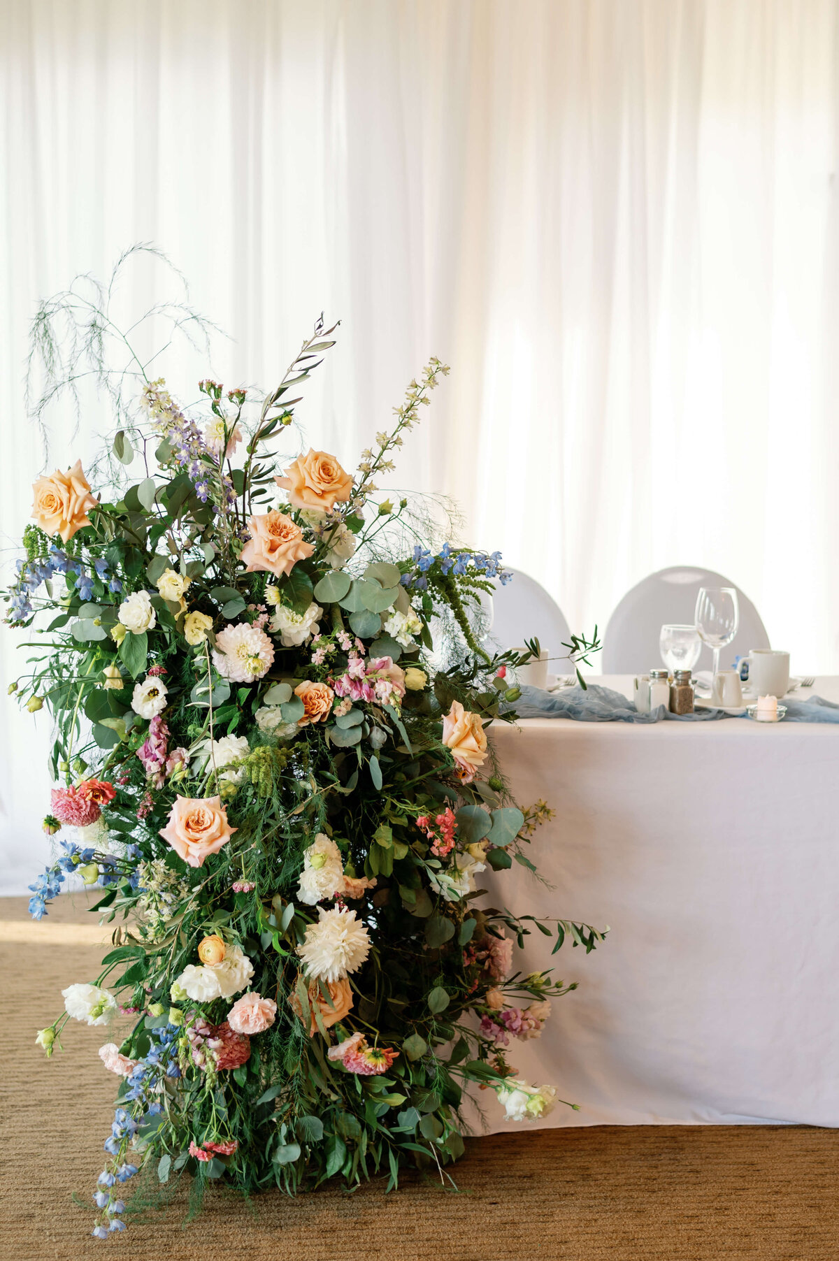 Floral arrangement on wedding table at Oak Island Resort wedding, Nova Scotia
