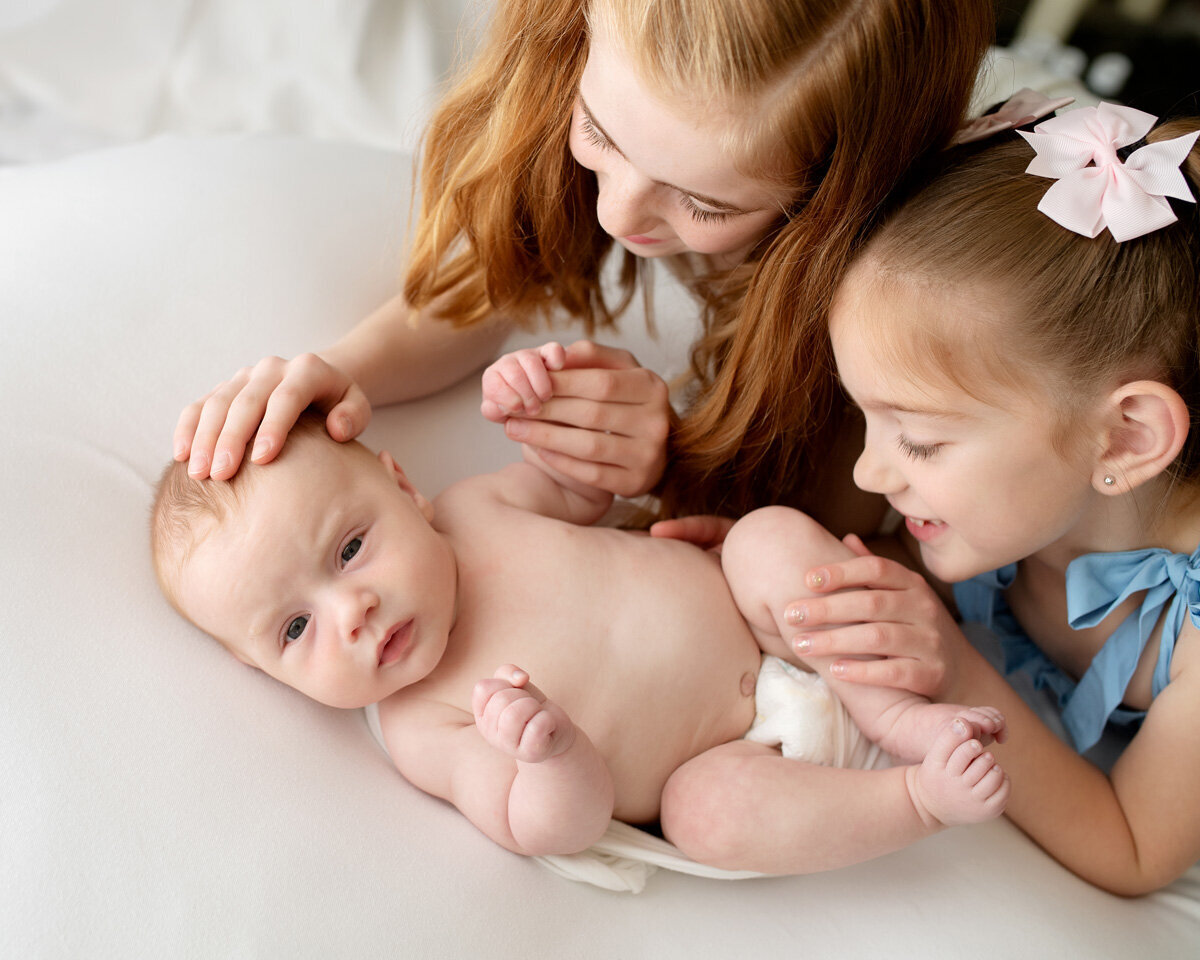 Newborn session with two older siblings