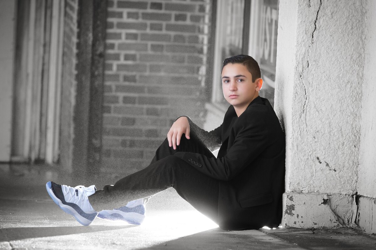 bar-mitzvah-preshoot-sitting-against-wall-asbury-park