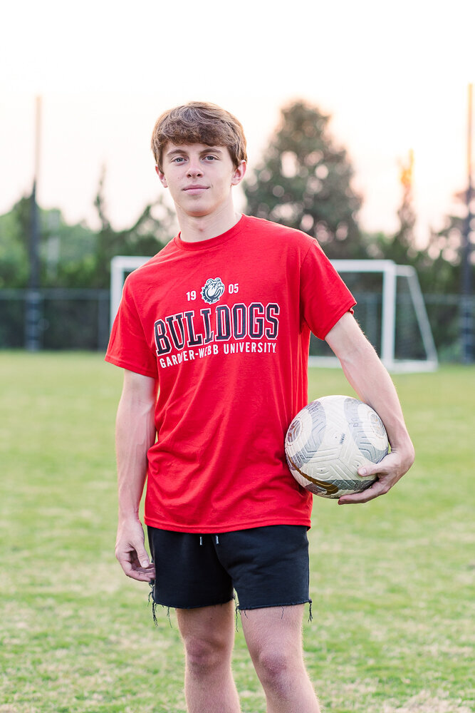 NRCA graduate photo session at NRCA soccer field in Raleigh, NC.