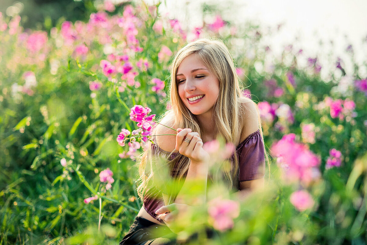 senior girl in flowers