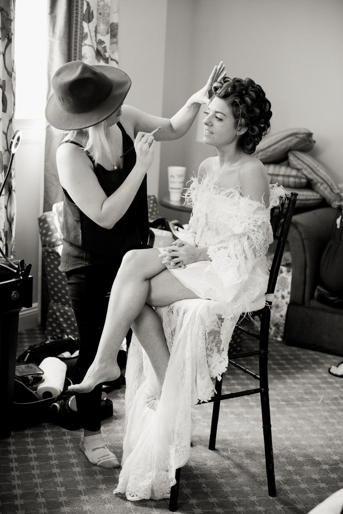Bride makeup finishing touches.