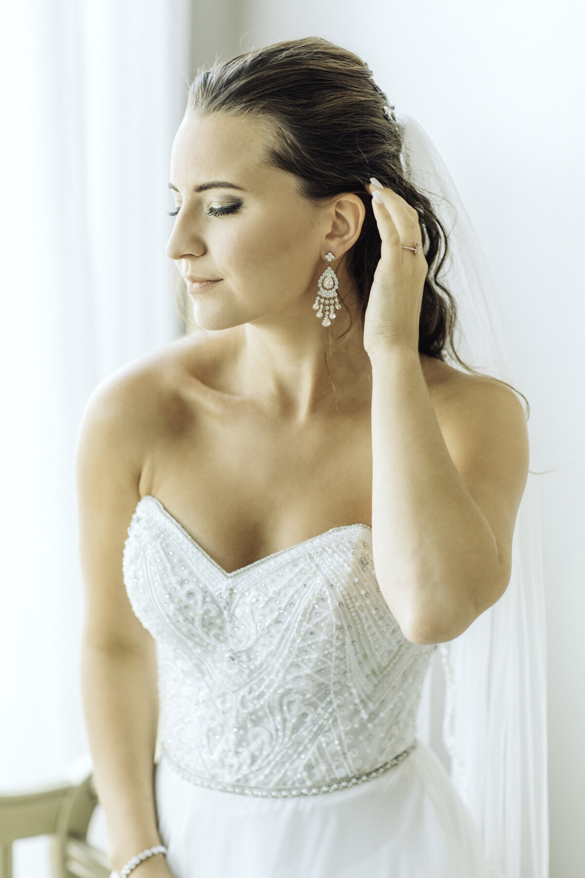 Wedding Photograph Of Bride Fixing Her Hair Los Angeles