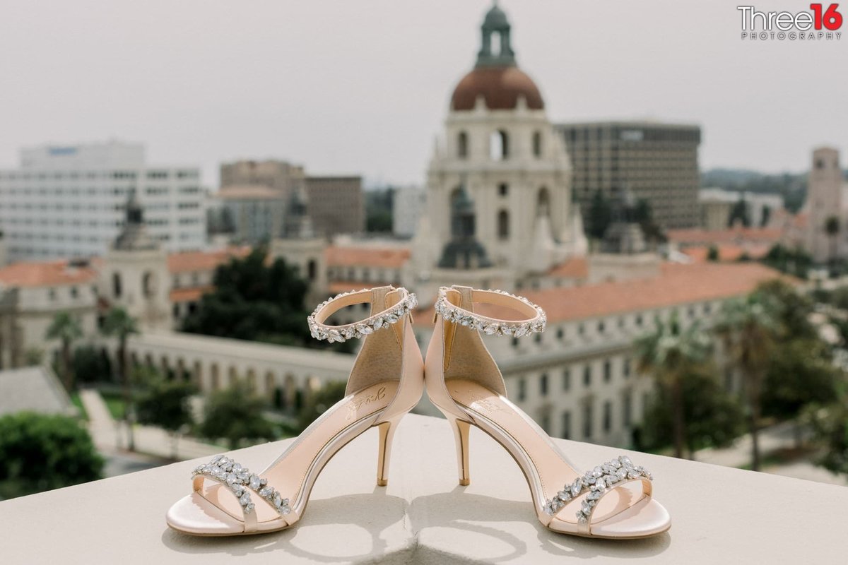 Bride's shoes on the balcony edge overlooking Pasadena