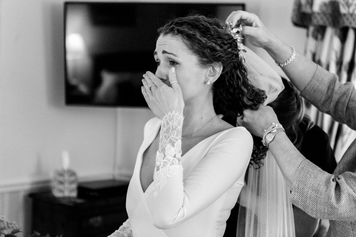 bride getting emotional during getting ready