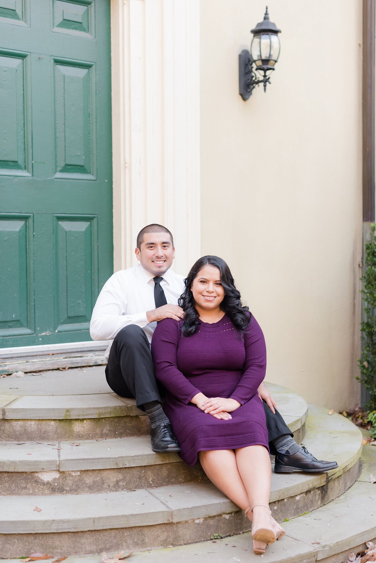 3_engaged-couple-sits-on-cross-estate-gardens-steps_1005