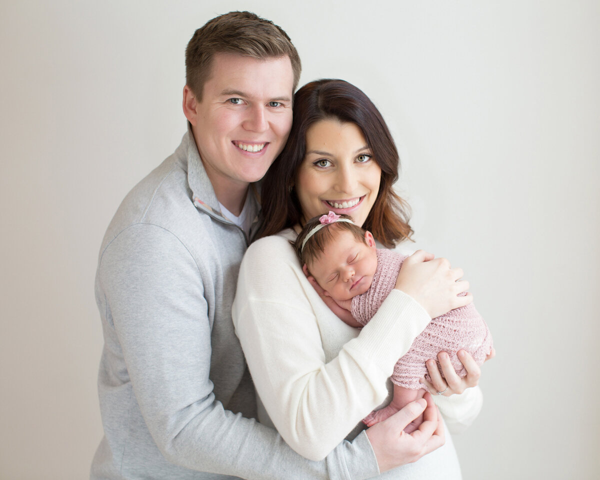 new-parents-with-baby-girl