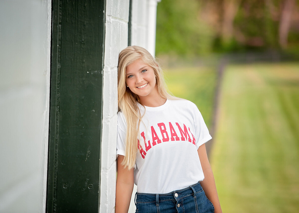 Senior session of young woman in Alabama tee shirt